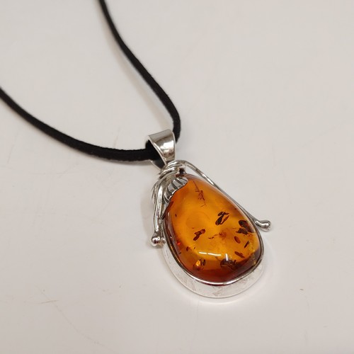 HWG-105 Pendant, Dark Amber, Pear Shape; Silver Leaf Accent $88 at Hunter Wolff Gallery