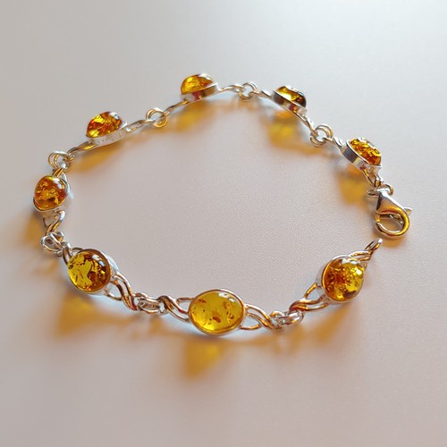 Click to view detail for HWG-111  Bracelet Golden Amber; Alternating 8 Ovals $60
