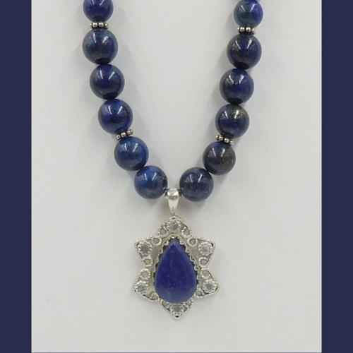 DKC-1177 Pendant Lapis Lazuli & S/S $280 at Hunter Wolff Gallery
