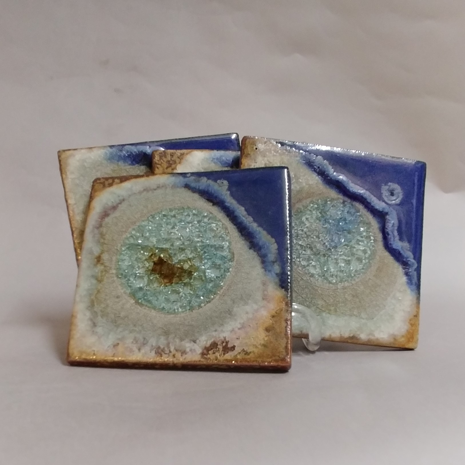 KB-588 Coasters Set of 4 Blue and Copper $43 at Hunter Wolff Gallery